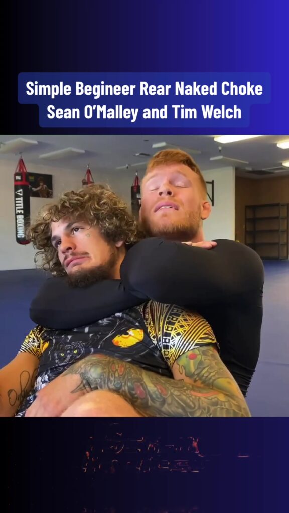 ‘Suga’ Sean O’Malley and Coach Tim Welch Demo Rear Naked Choke.