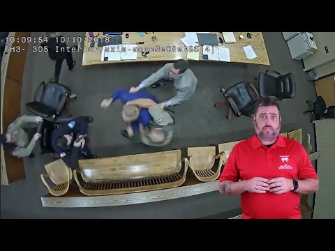 A Man Lunges For An Officer's Firearm In A Courtroom