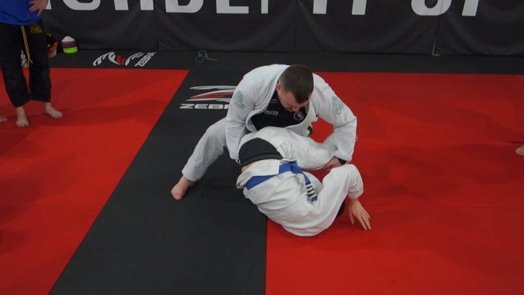 Attacking the Guard Roll Part 2 by Coach John Sheridan