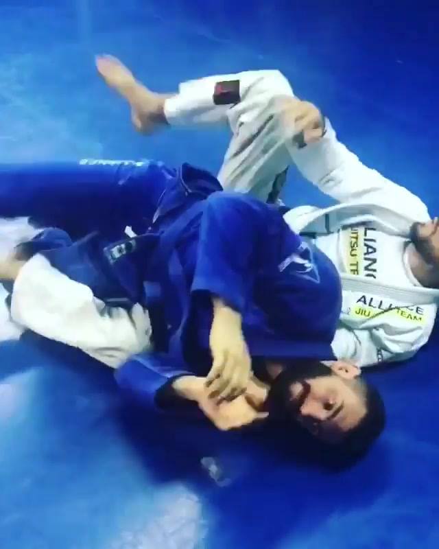 Awesome guard pass with lapel choke from side control. Technique by @adrianoallia...