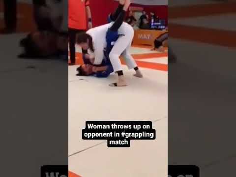 BJJ Woman throws up