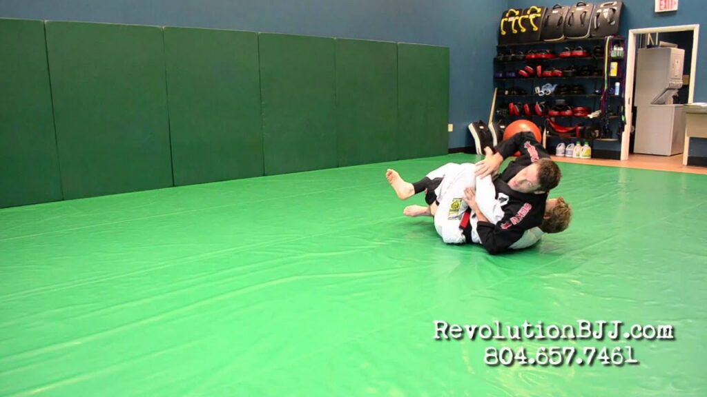 BJJ technique: advanced scissor half guard Kimura sequence