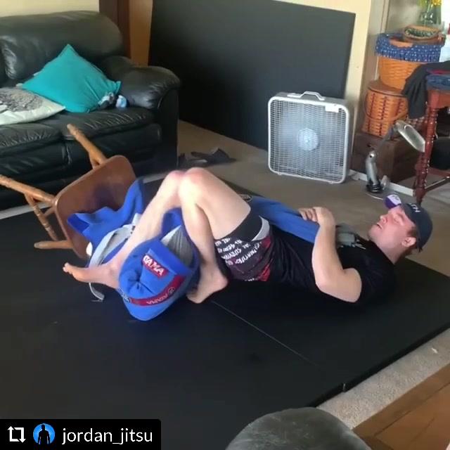 Butterfly hook sweep to armbar, quarantine style, by Jordan Peitzman.