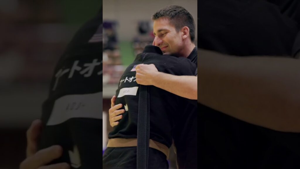 Cole Abate receives his black belt from Gui Mendes in Japan