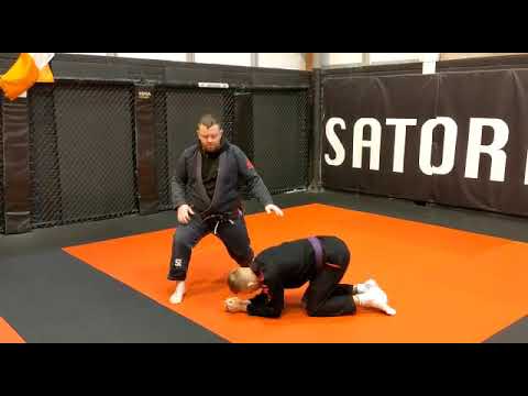 Finishing with the Cross Collar grip from Front Headlock