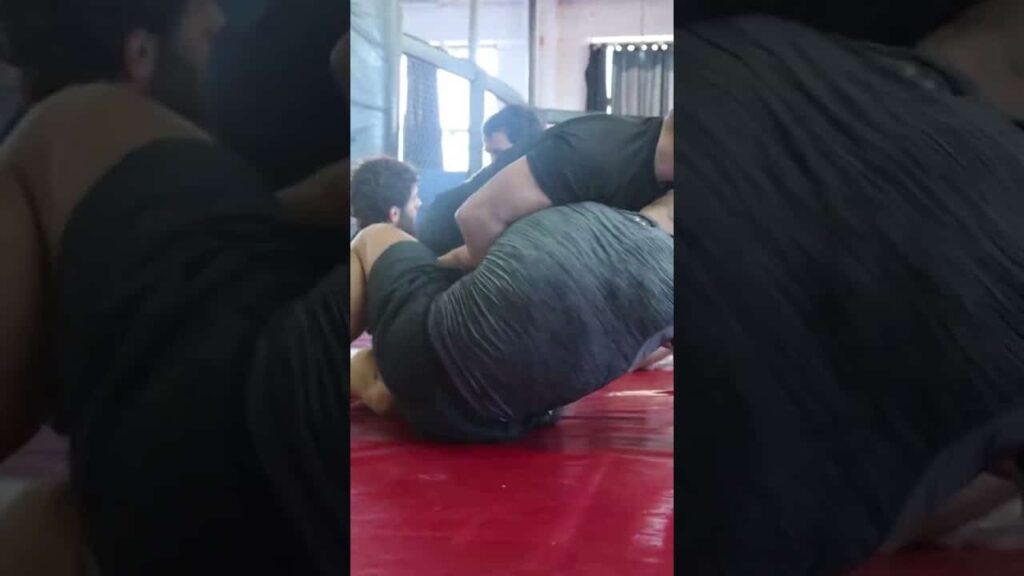 GSP and Coach Zahabi having a friendly roll.