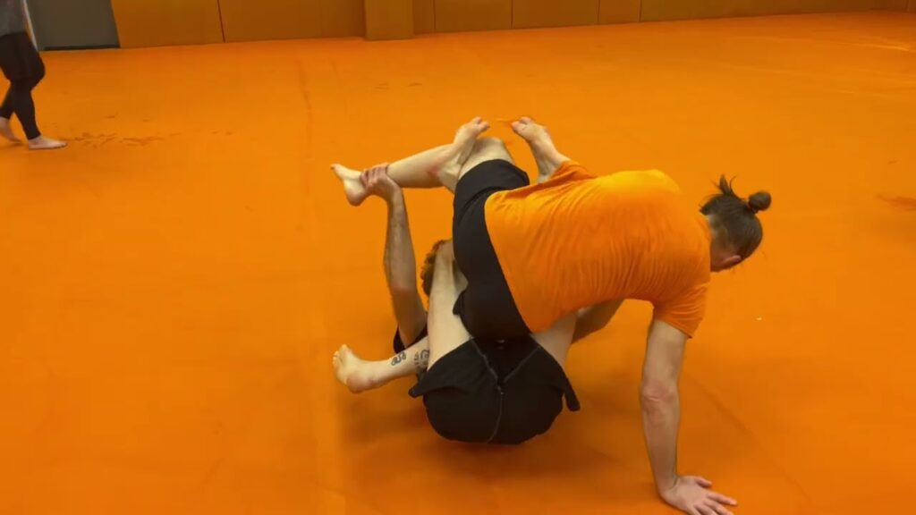 Guard Retention: Inverting and Sweep to Modified Saddle with Inside Heel Hook