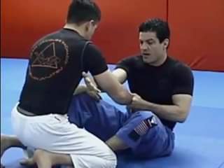 Jean Jacques Machado demonstrates how to use the arm drag as a means of securing