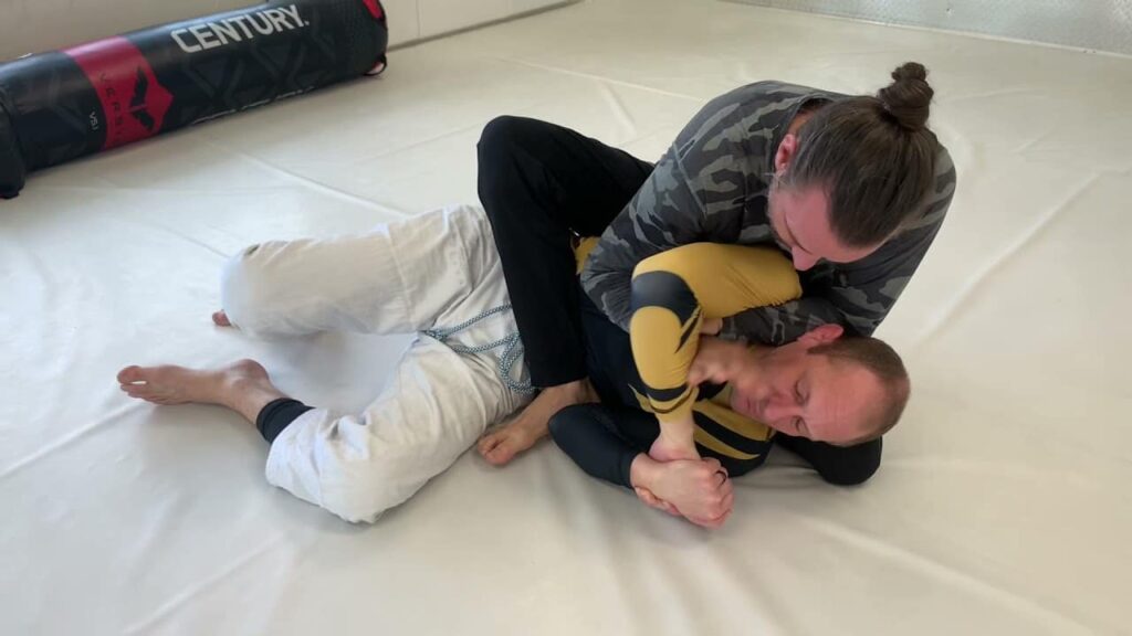 Neck Manipulation to Strangulation (Kimura grip)