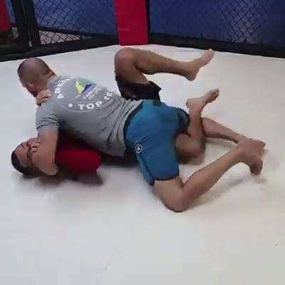 Octopus half guard to back take