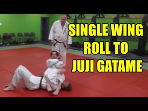 SINGLE WING ROLL TO JUJI GATAME