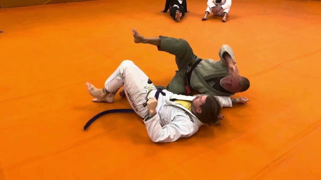 Shoulder Clamp Sweep from Closed Guard