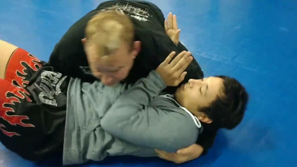 Shoulder choke to Arm triangle