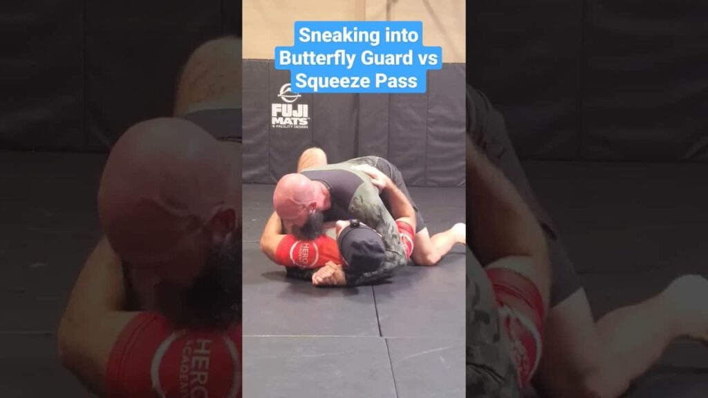 Sneaking into Butterfly Guard vs Squeeze Pass