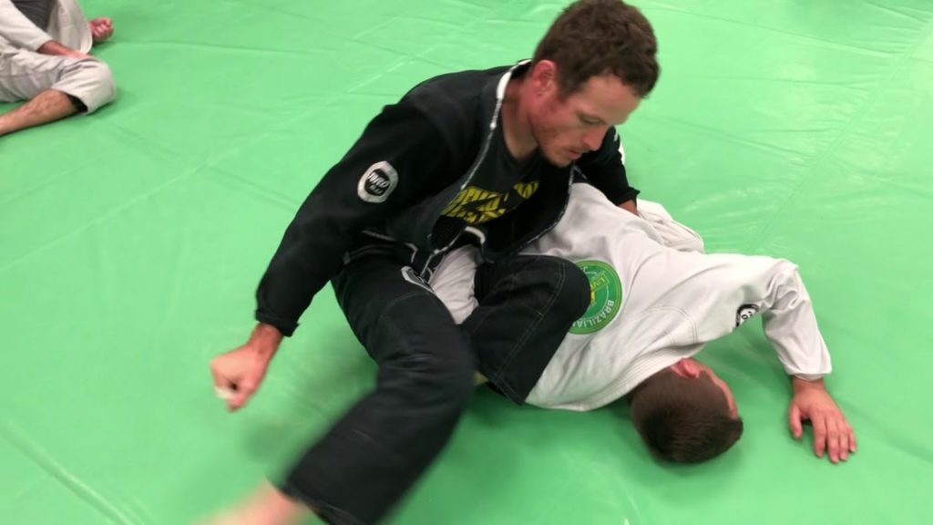 Spider Guard:  Sweep to Omoplata Set Up