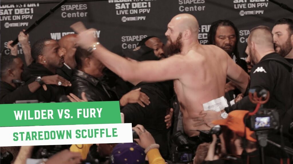 Tyson Fury and Deontay Wilder Get Physical at Final Press Conference Staredown