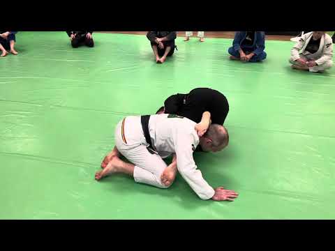 Using a Kimura from Half Guard Bottom to Take the Back