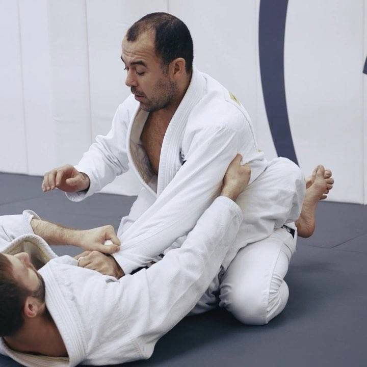 Very important detail on how to break grips from close guard by Marcelo Garcia J...